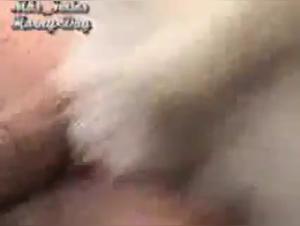 Amateur woman and her dog in a bestiality video