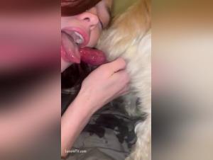 Amateur redhead woman in bestiality sex video with dog