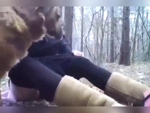 Bestiality in the forest: a woman and a dog