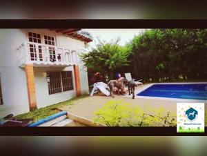 A woman and her dog in a beastly video