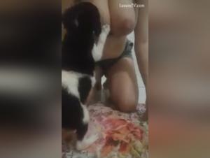 A woman and her dog in a bestial relationship