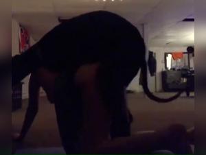 Bestial encounter between a blonde and a black dog