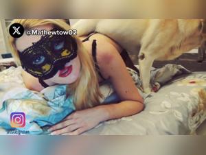 Blonde woman and dog in a zoophilia video