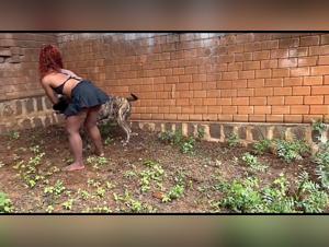Sexy dog owner has a wild animal encounter in the zoo