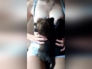 Extreme puppy breastfeeding: a woman and her dog