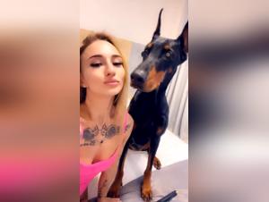 Sonya and her canine friend in an intense zoophilia scene