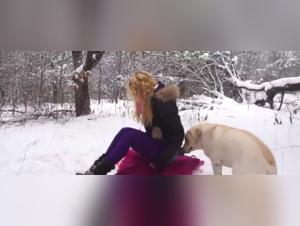 Woman and dog in nature: a beastly encounter