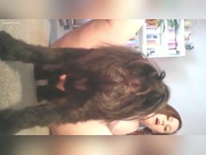 Bestiality: a woman and a dog in an extreme video