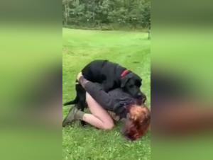 Woman and dog in nature: a breathtaking zoophilia video