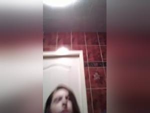 Woman caresses her pussy before the dog comes to lick her