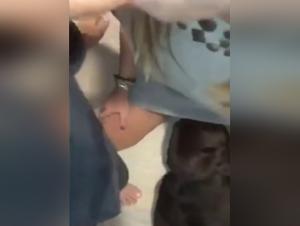 Woman submissive to her dog in a zoophilia video