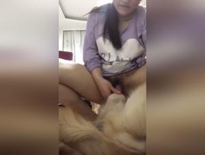 Asian woman and her dog: a zoophilia video not to be missed