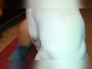 Mature woman and her dog in a bestiality scene