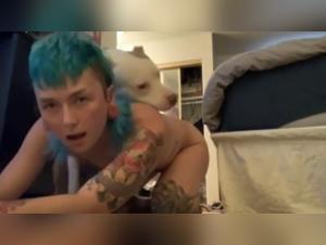 Fuck with a dog: a young tattooed punk lets herself go completely
