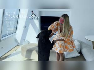 Veronica Silesto and her dog at the Orange Party: a beastly evening