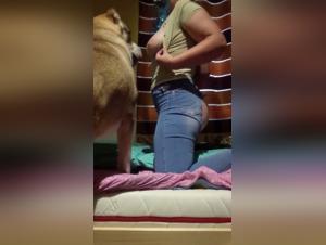 Dog and woman in bestiality sex scene