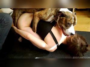 Beautiful Russian and her dog in a zoophilia scene