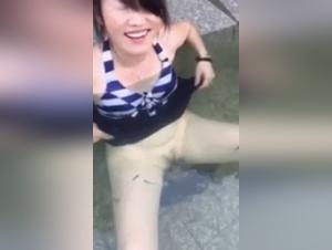 Asian Girl's Intimate Moment with Her Canine Friend