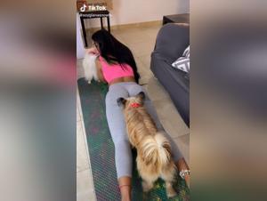 Woman and dog in leggings on TikTok