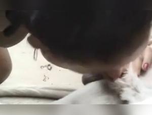 Brazilian woman and her dog in a bestiality sex scene