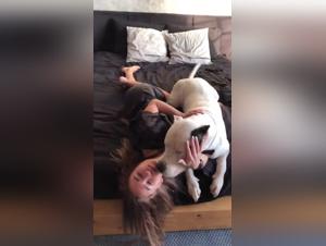 Sonya and her canine companion in an extreme zoophilia video