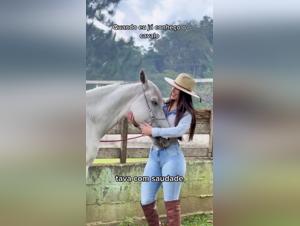 Woman dancing with her horse in explicit video