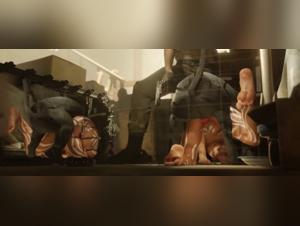 A woman and her dog in a cage of bestial love