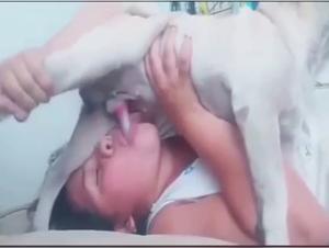 Curvy woman and dog: a hardcore zoophilia video