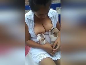 Asian woman and puppies in extreme zoophilia scene