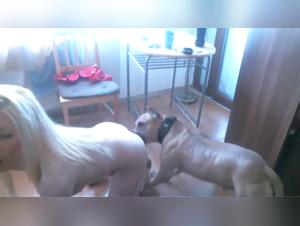 Selena and her dog in a bestial scene