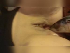 Woman and Fish: An Unusual Encounter