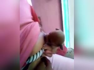 Puppy Breastfeeding - Woman and Dog